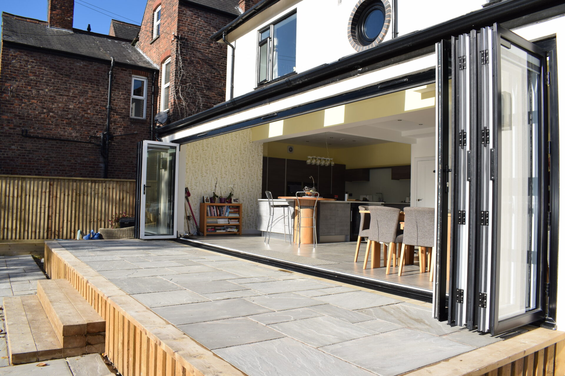 Aluminium Concertina Doors : LARGE open smart bifold doors looking inside from outside