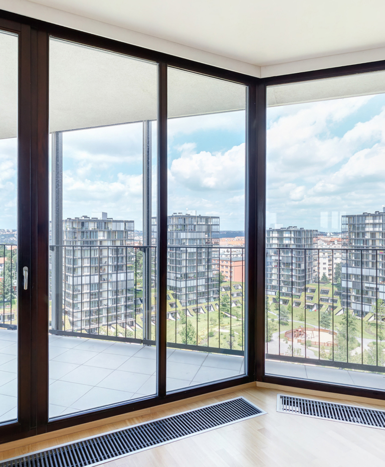 aluminium bifold doors: aluspace internal screening solution in an office setting with background views