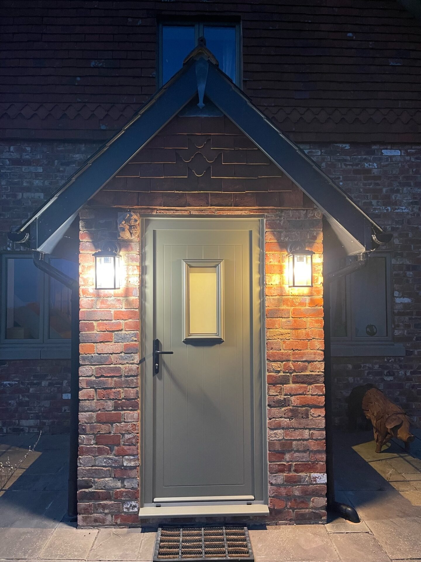 Door : smart signature door in a traditional brick setting