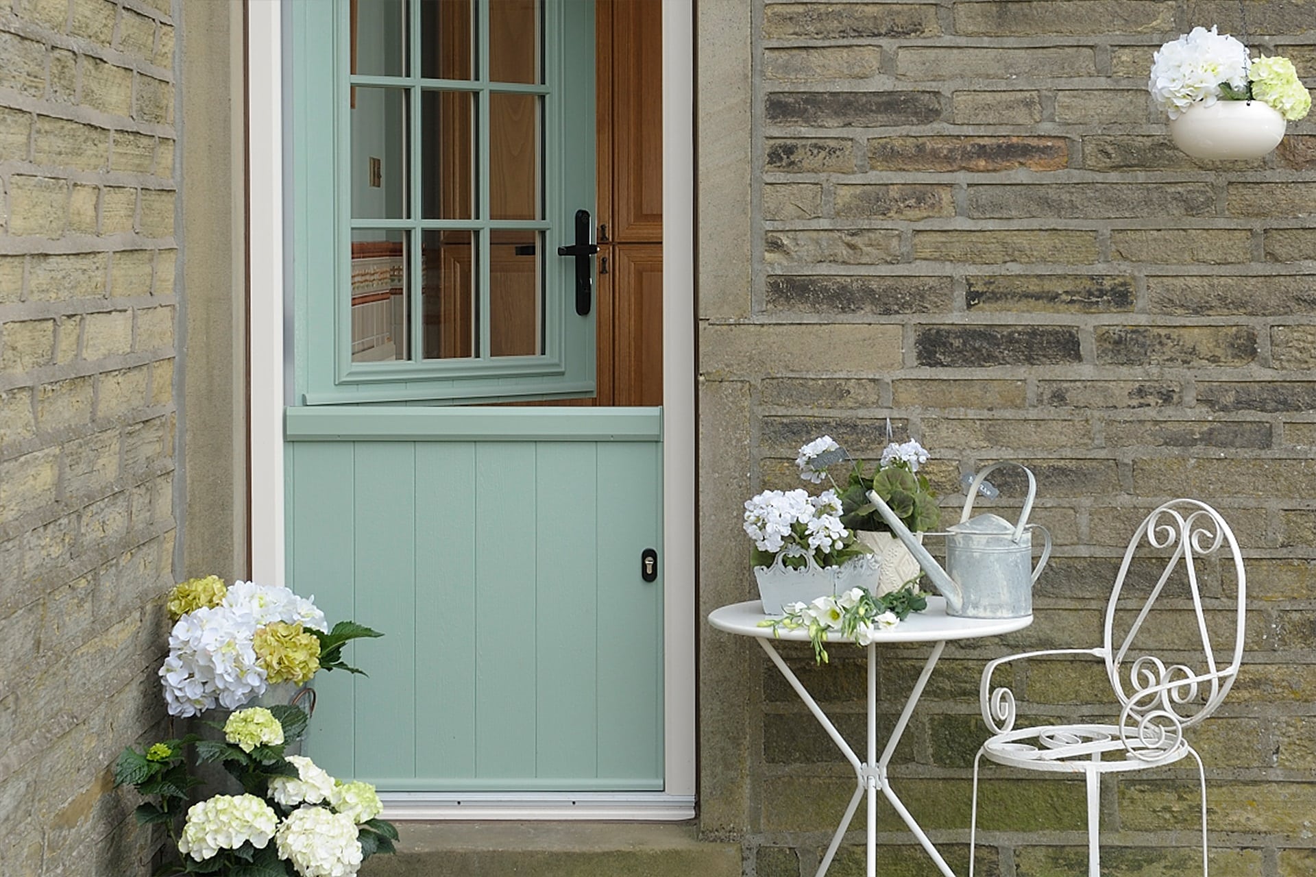 Stable Doors : light mint stable door against a brick wall