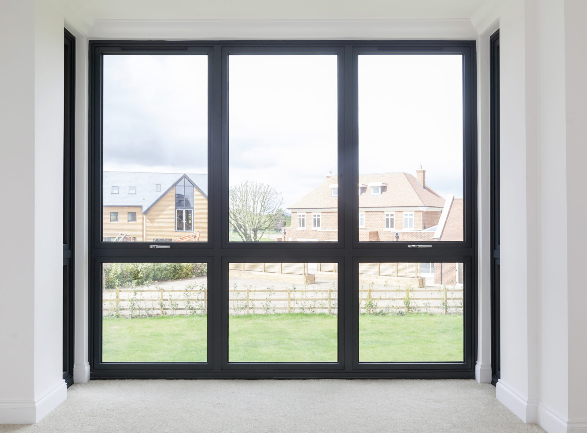 How Much Will New Windows Save On Energy? : Large aluminium windows zoomed in.