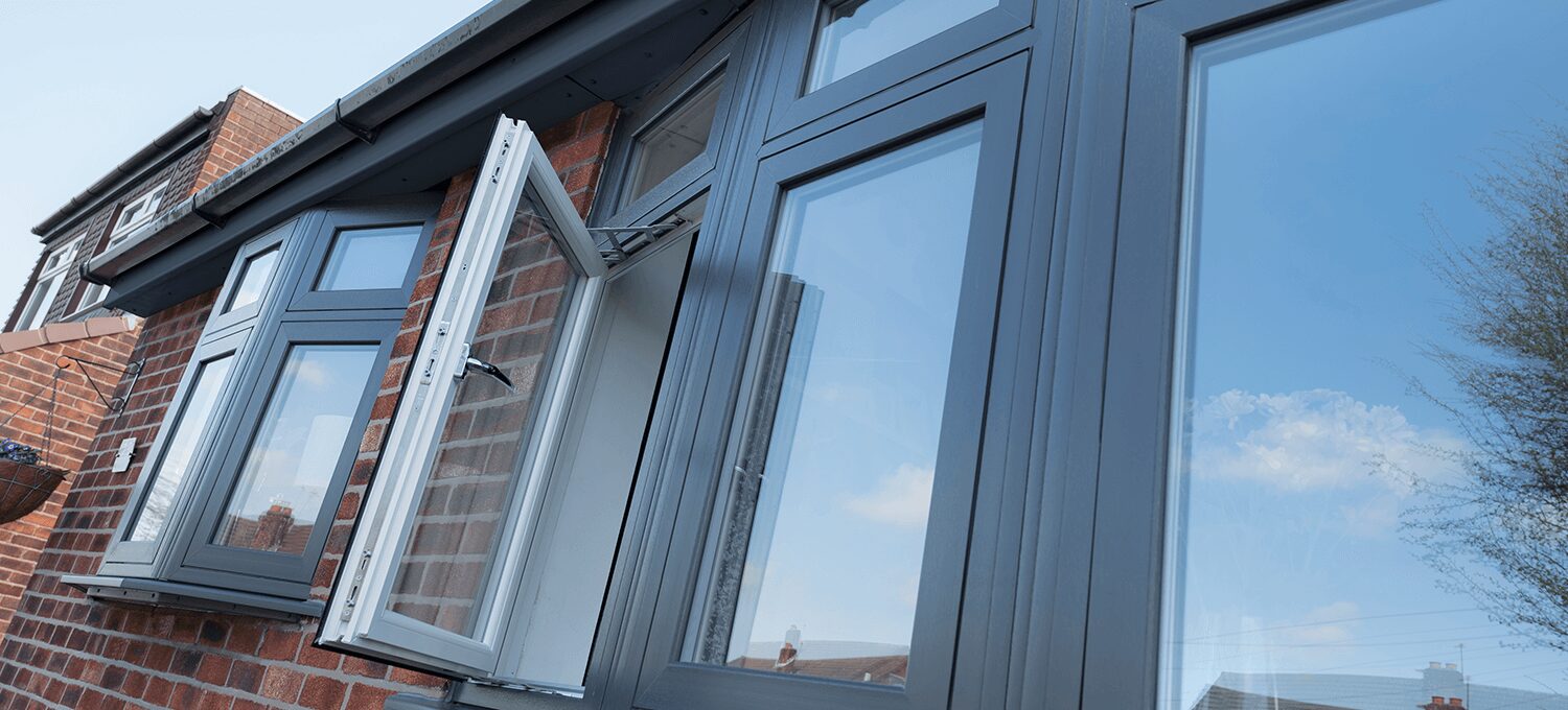 How Much Will New Windows Save On Energy? : A house with windows installed and one window open