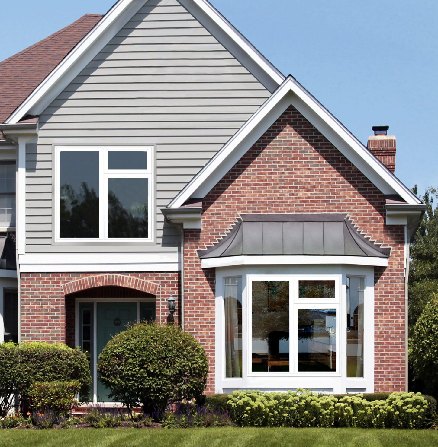 aluminium framed windows: Front view of house with aluminium windows.