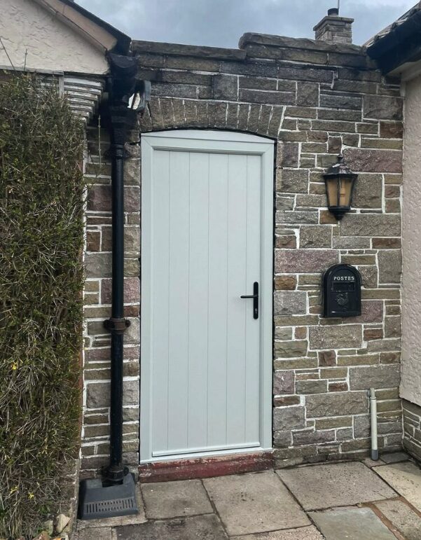 Front door colours: Comp Door Norfolk in Agate Grey.