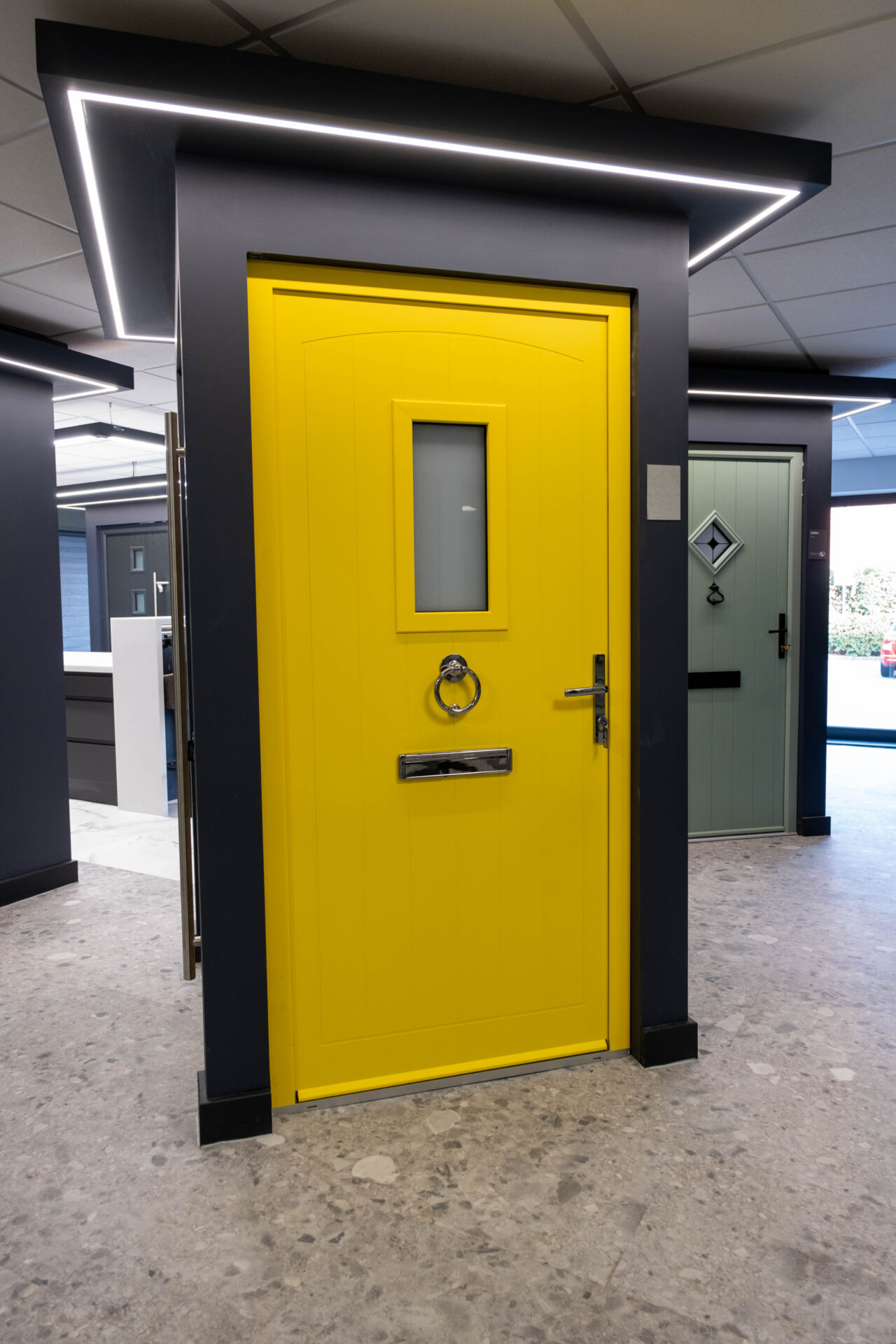 Window showroom: Smart signature broadfield door in zinc yellow.