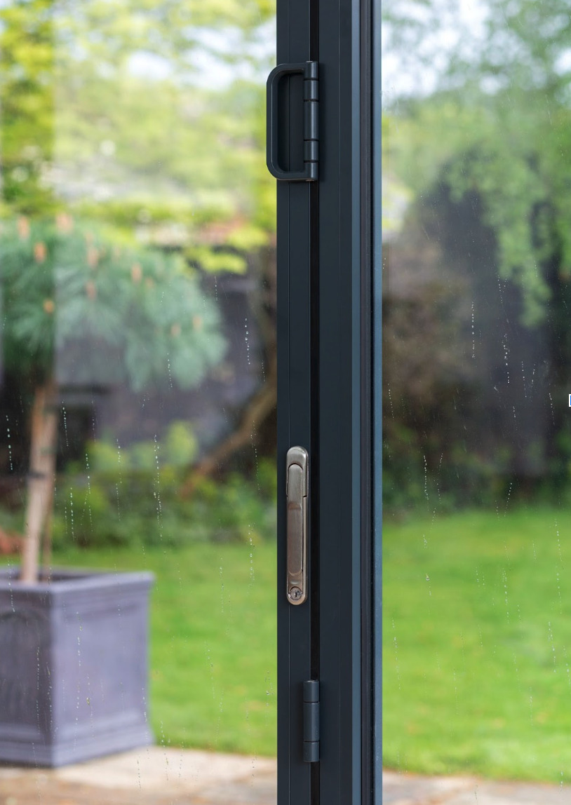 Bifold door handle, close up view.