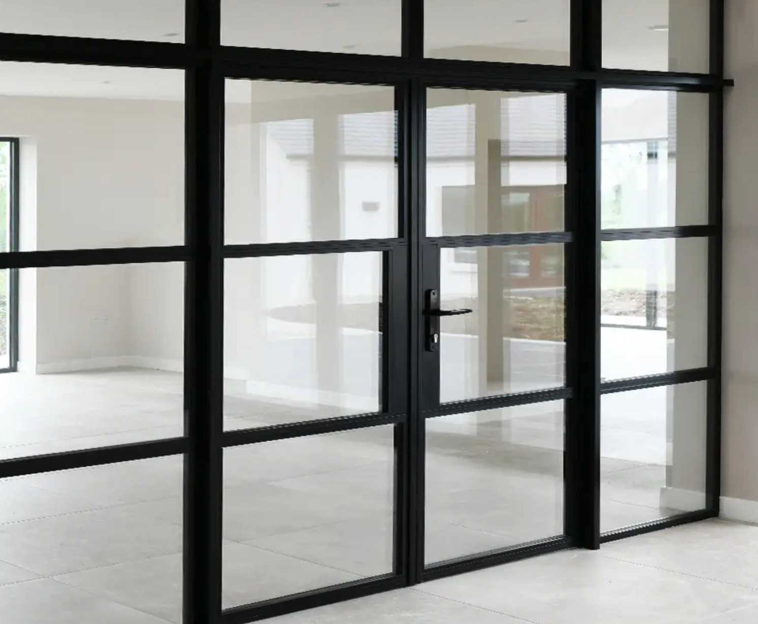 alternative to bifold doors: Crittall doors installed in a home.
