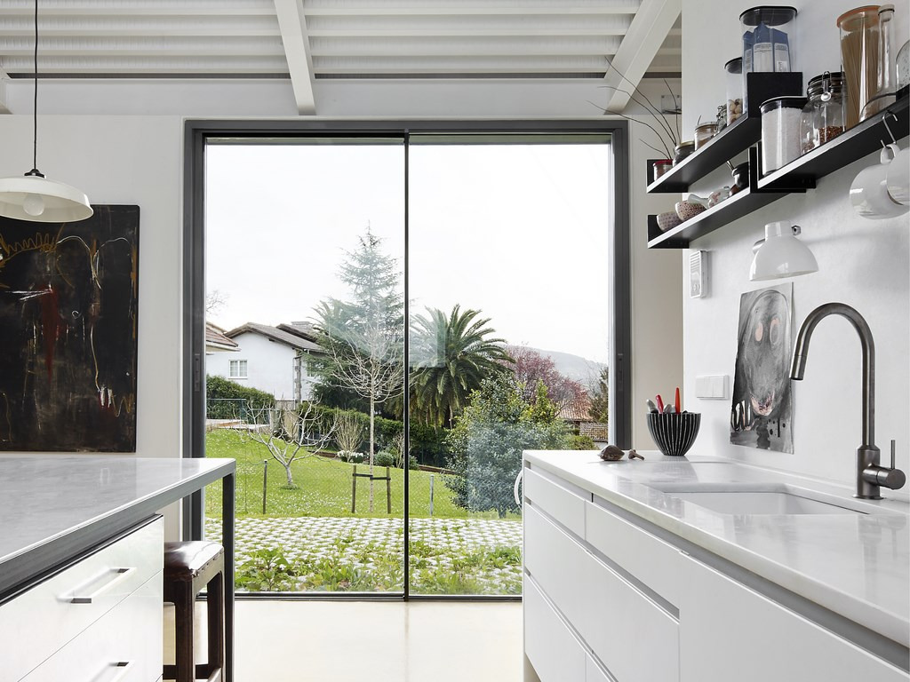 alternative to bifold doors: Cortizo Cor Vision sliding door fitted in a kitchen.