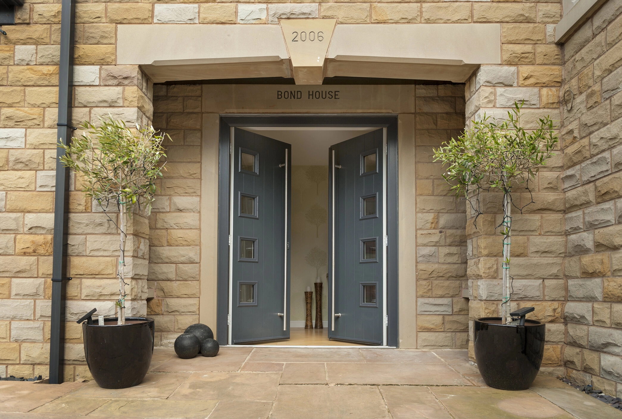 front door: Solidor French Doors opening out onto the front entrance.