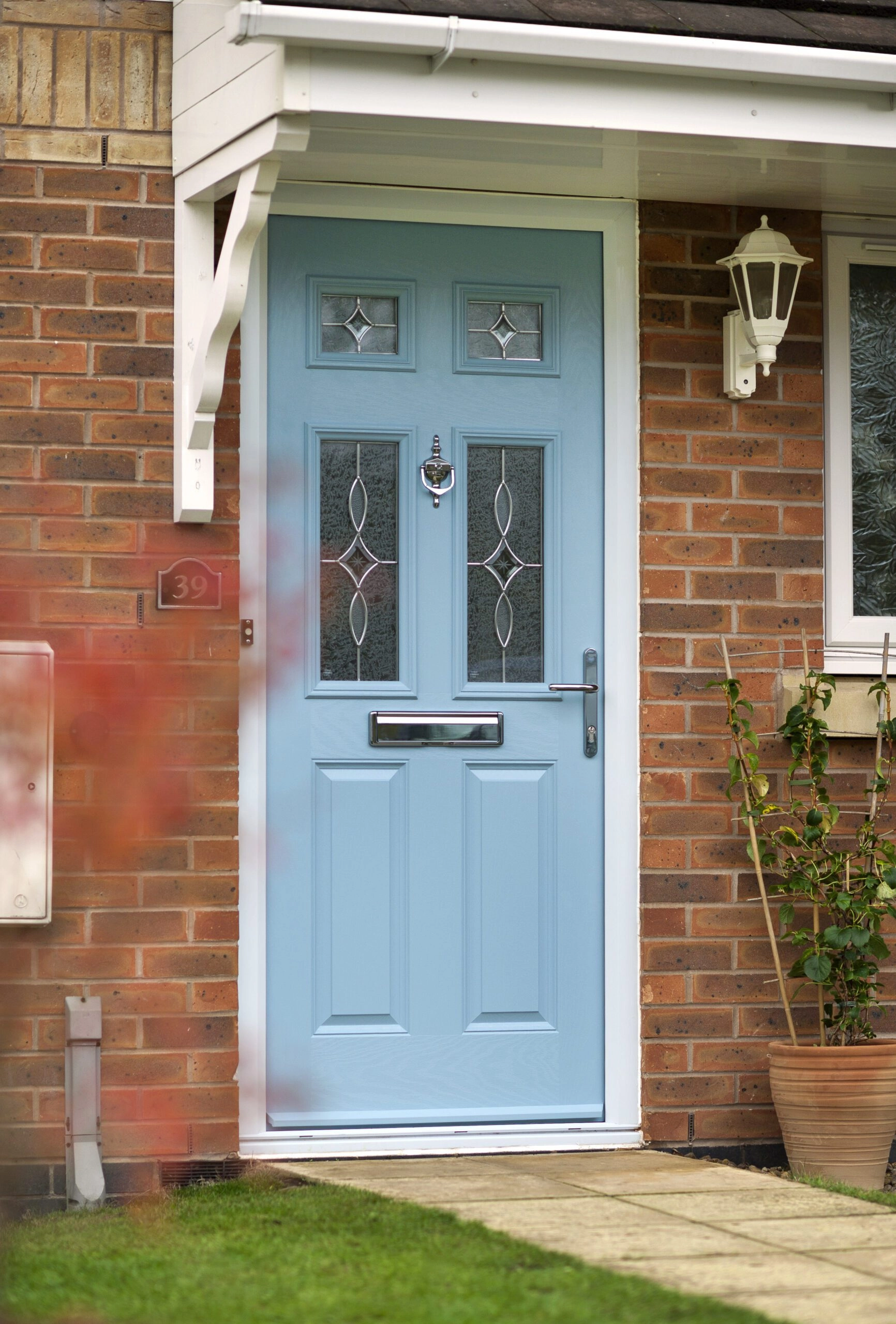 front door: 2 Panel 4 square Door Stop door in Duck Egg Blue.