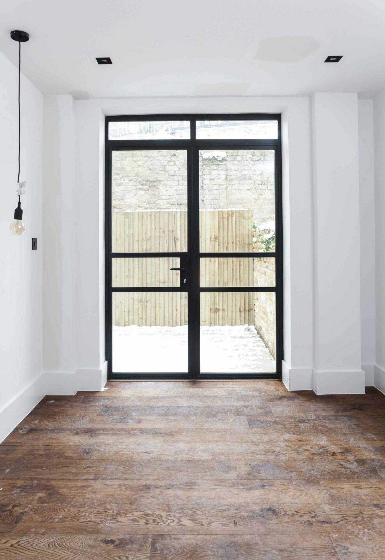 Industrial-style windows: industrials style door installed in property.